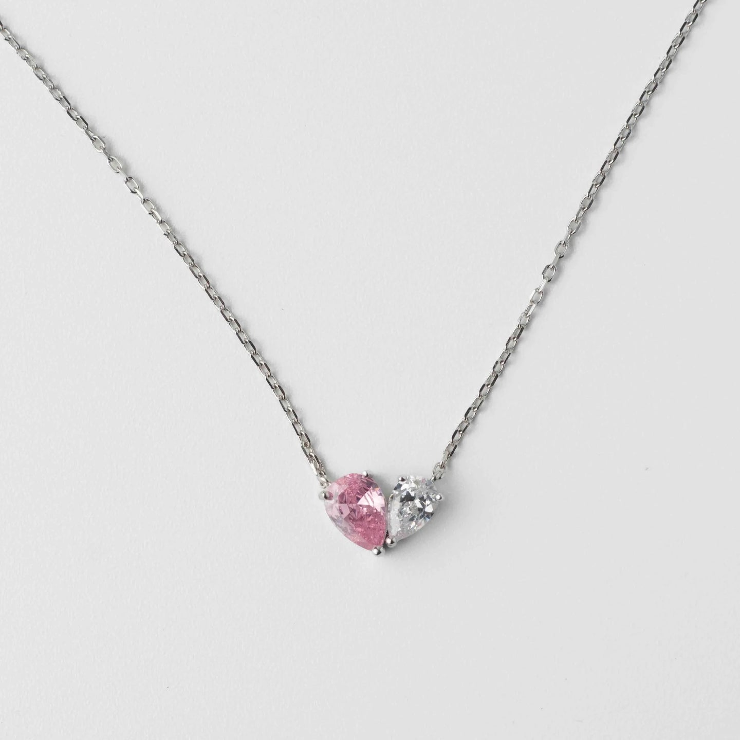 Half pink heart cubic zirconia necklace